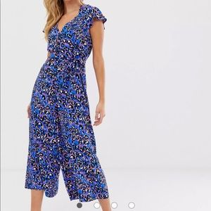 ASOS DESIGN button front frill sleeve jumpsuit in animal print